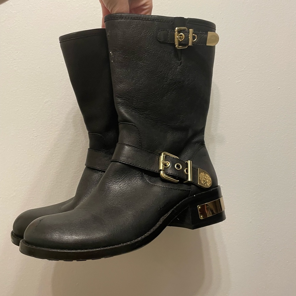 Black Vince Camuto boots with gold trim